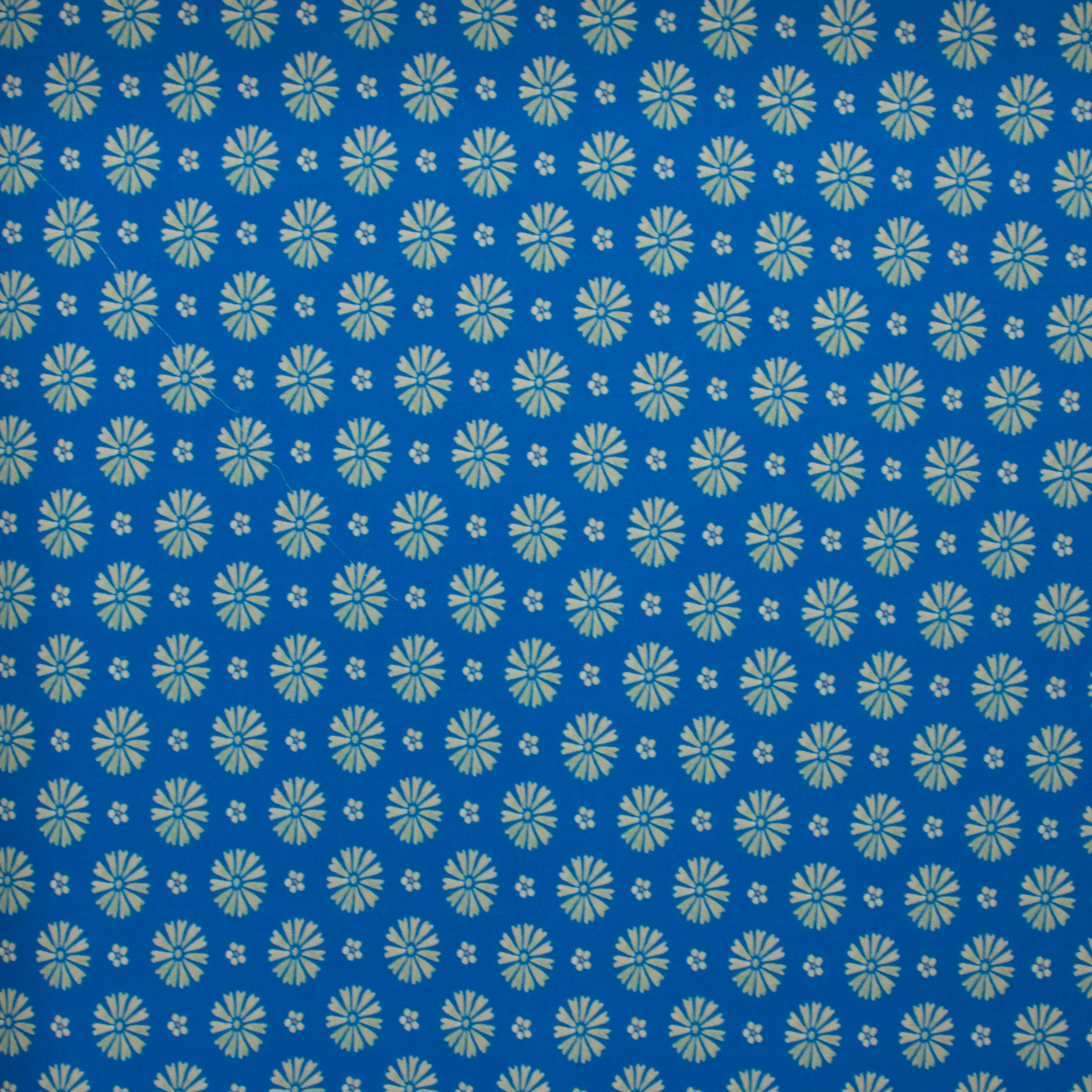 Polyester crêpe blauw met grijze bloemen - A La ville